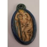 A Compton Art Pottery, attributed, a Saint Christopher pendant, unmarked, 4.8cm long