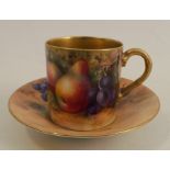 A Royal Worcester coffee can and saucer, decorated with hand painted fruit by Ayrton and Hale, circa