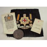 2983 PTE F Scutt R. SUSS. R., two service medals, a regimental embroidery for The Royal Sussex Regt.