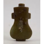 An oriental style hardstone (possibly jade) scent bottle, having two small lug handles, height 2.