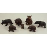 Seven various Black Forest carved models, of bears in various poses, height 3.5ins and down