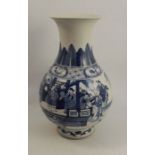 An oriental baluster vase, decorated with panels of figures in landscapes, with various character