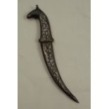 An Indian style dagger, in the niello style, with a horses head, hilt and curved blade, length 6.