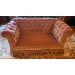 A drop-end Chesterfield, with deep button upholstery, width 63ins