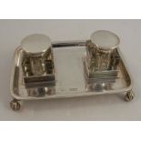 A silver desk stand, of rectangular form, fitted with two square glass and silver mounted