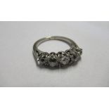 A five stone diamond ring, in an unmarked white mount, 0.75 carats estimated total, finger size J