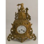 A 19th century French gilt metal mantle clock, by Japy Freres, surmounted by a lady holding a