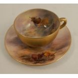 A Royal Worcester miniature tea cup and saucer, decorated with highland cattle by Harry Stinton,