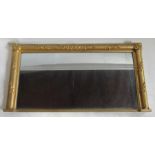 A gilt framed over mantel mirror, of rectangular form, decorated with flowers, overall size 29ins