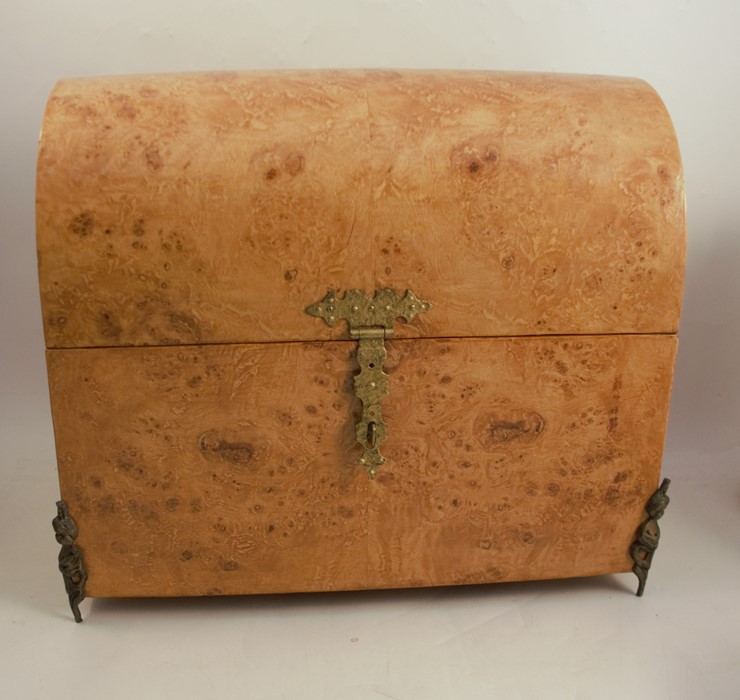 A burr wood dome top casket, with gilt metal mounts, width 19.75ins, height 17.5ins, depth 10.75ins