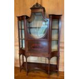 An Edwardian style mahogany secretaire display cabinet,  having a central shield shaped glazed door,