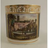 A 19th century Derby tankard, decorated with a named view of Warwick Castle, to a green ground