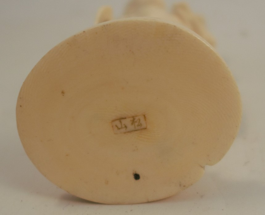 A 19th century carved ivory figure, of an Eastern man with harvested crops on his back, signed to - Image 5 of 6