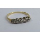 A five stone diamond ring, set with graduated old cut stones, totalling approximately 0.38cts,