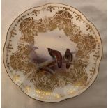 A Royal Worcester plate, decorated with partridge to gilt borders by James Stinton, circa 1903,