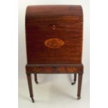 A late Georgian mahogany dome top cellarette, raised on a stand with a floral marquetry panels,