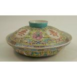 A Chinese covered shallow bowl, decorated with flowers to a yellow ground af, diameter 9insCondition