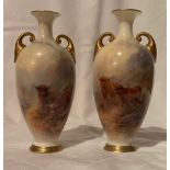 A pair of Royal Worcester vases, decorated with highland cattle by H Stinton, having short gilt