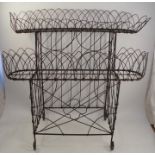 A two tier wire-work planter, width 34ins x height 31ins