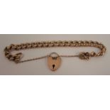 A 9 carat gold bracelet, of solid curb links, to a padlock clasp, 24g gross