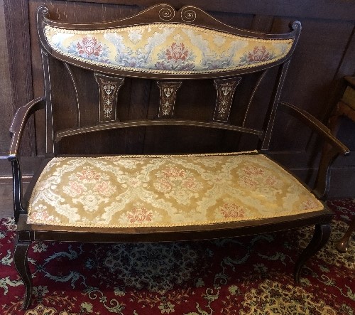 An Edwardian salon suite, comprising a sofa and four chairs, with bone and satinwood marquetry