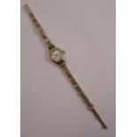 Cara, a lady's 9 carat gold mechanical wrist watch on a 9 carat gold bracelet, 13.5g gross,