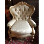 A gilt framed continental armchair, with scroll arms, trade only