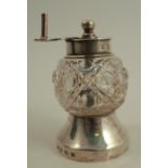 A glass and silver pepper grinder, Birmingham circa 1900, height 2.5ins
