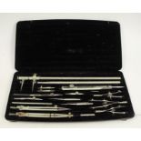 A cased set of drawing instruments