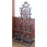 A 19th century Deville Pailliette & Co Arts and Craft style metal and wooden hallstand, with cloak