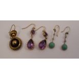 A pair of Edwardian amethyst crop earrings, the pendeloque stones to stone set hook fittings,