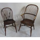 A stick back saddle seated Windsor armchair, with crinoline stretcher, together with two similar