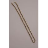A chain, stamped '750', of solid rope links, 44.5cm, 24g gross