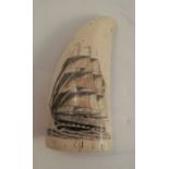 A scrimshaw whale's tooth, decorated with a two masted ship, height 4.5ins