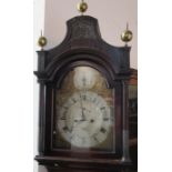 A Georgian mahogany long case clock, the arched silvered dial inscribed Thomas Percival, London,