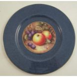 A Royal Worcester plate, decorated with a small central panel of fruit by William Bee, to a