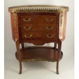 A continental marble topped chest of drawers, with three drawers, raised on slender legs, the