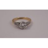 A diamond single stone ring, the brilliant cut, measuring approximately 6mm by 3.3mm, calculated