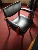 A black office open arm chair