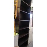 A dark wood book shelf unit, width 28.5ins x height 92ins