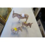 3 BESWICK MODELS OF DONKEYS, HEIGHTS 5.75INS AND DOWN