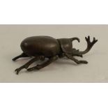 A modern Japanese style bronze model, of a beetle, signed, length 2.75ins