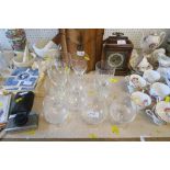 A COLLECTION OF GLASSES, DECORATED WITH BIRDS, INCLUDING WINE GLASSES AND BRANDY BALLOONS
