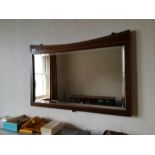 A mahogany cross banded over mantle mirror, width 32ins x max  height 21ins