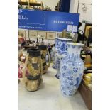 A PAIR OF BLUE AND WHITE VASES OF BALUSTER FORM, DECORATED IN CHINESE STYLE, HEIGHT 18INS X MAX