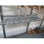 A quantity of chrome coat hangers