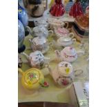 A COLLECTION OF TEAPOTS (10)