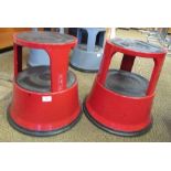 2 red kick stools