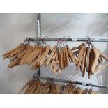 Approximately forty ladies and childrens coat hangers