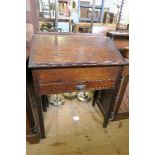 AN OAK CLERK'S DESK, WIDTH 32INS X DEPTH 19INS X HEIGHT 42.5INS